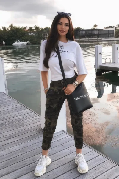 brunette escort Amsterdam Joya casual outfit outdoor walk sporty look natural beauty long legs
